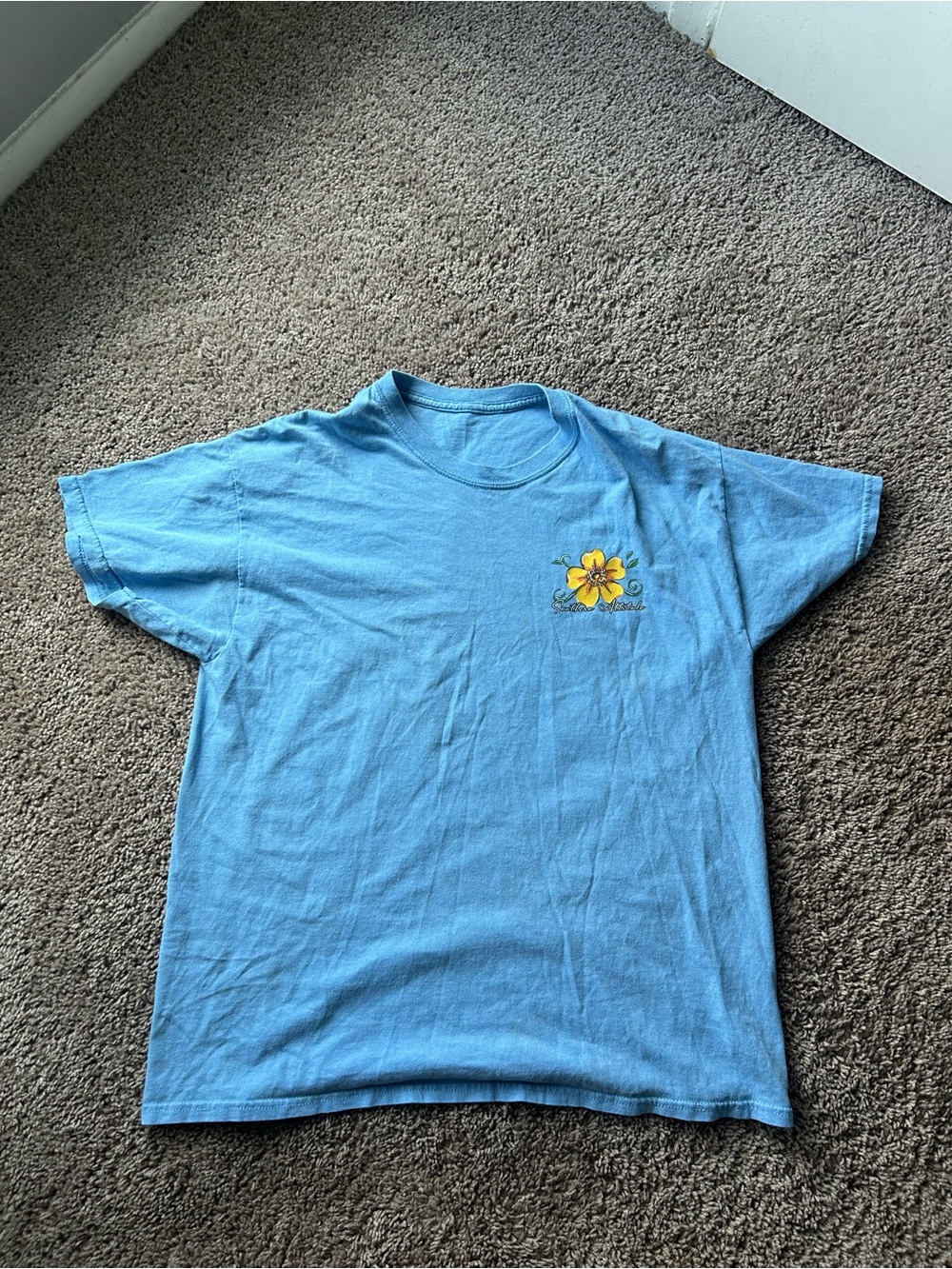 Light Blue Short Sleeve Tee with Yellow Flower Chest Graphic